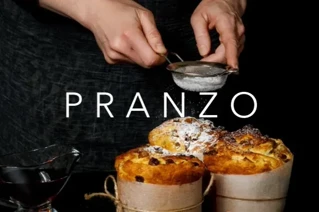 Bilde av et bakeverk med teksten "Pranzo" over.